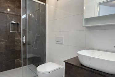 Spacieux appartement neuf avec parking au centre du village de Champagne