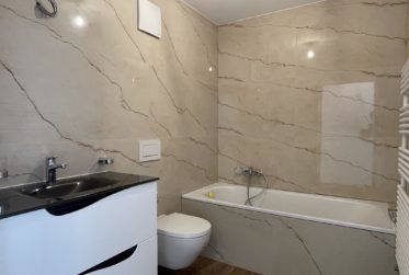 Spacieux appartement neuf avec parking au centre du village de Champagne