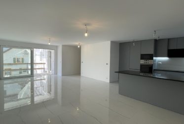 Spacieux appartement neuf avec parking au centre du village de Champagne