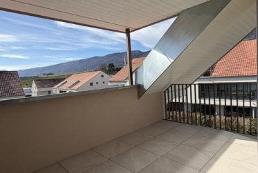 A Champagne - Dernier appartement A VENDRE dans nouvelle promotion - 3.5 pièces avec balcon et parking souterrain