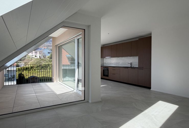 A Champagne - Dernier appartement A VENDRE dans nouvelle promotion - 3.5 pièces avec balcon et parking souterrain